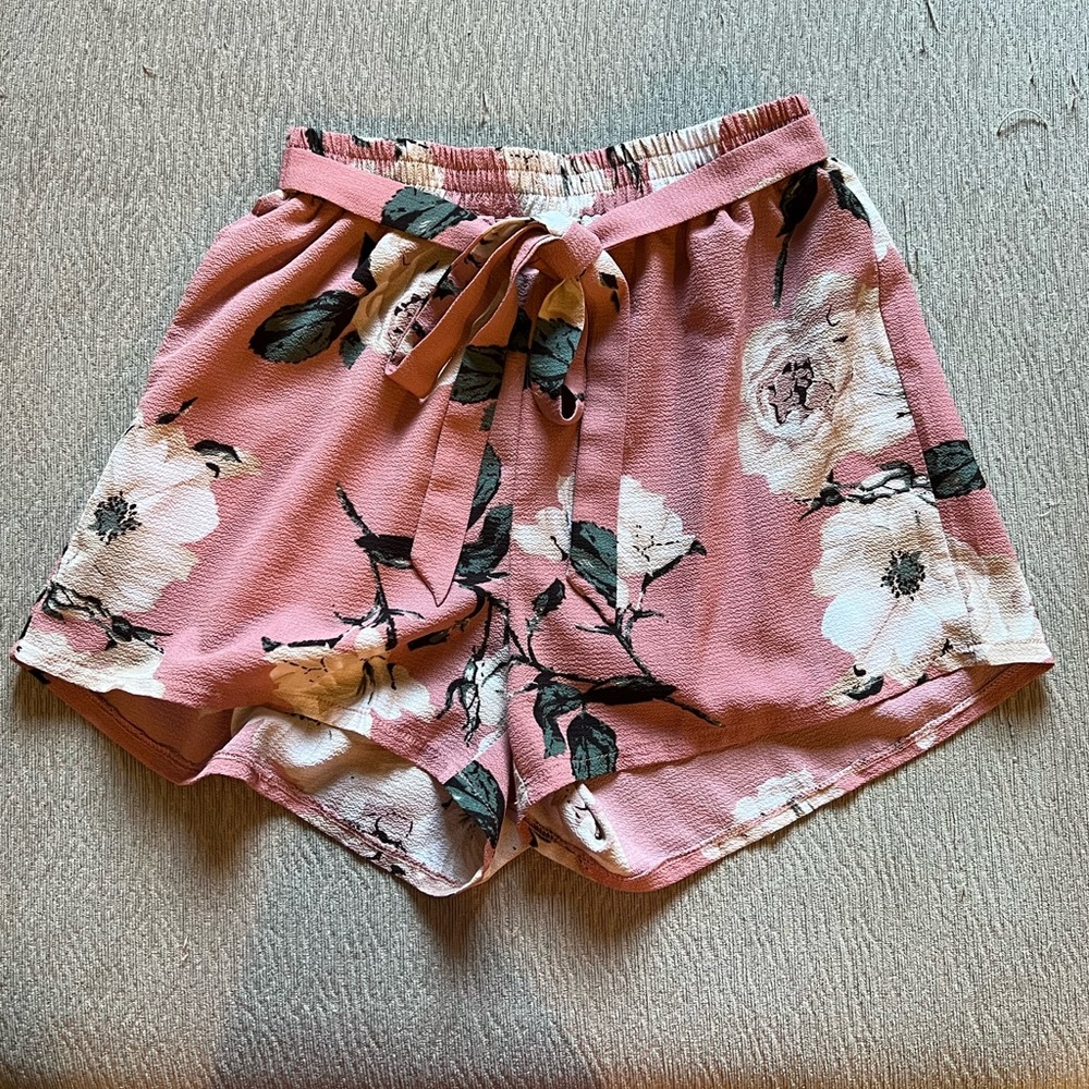 Pink floral shorts with ribbon tie in the front